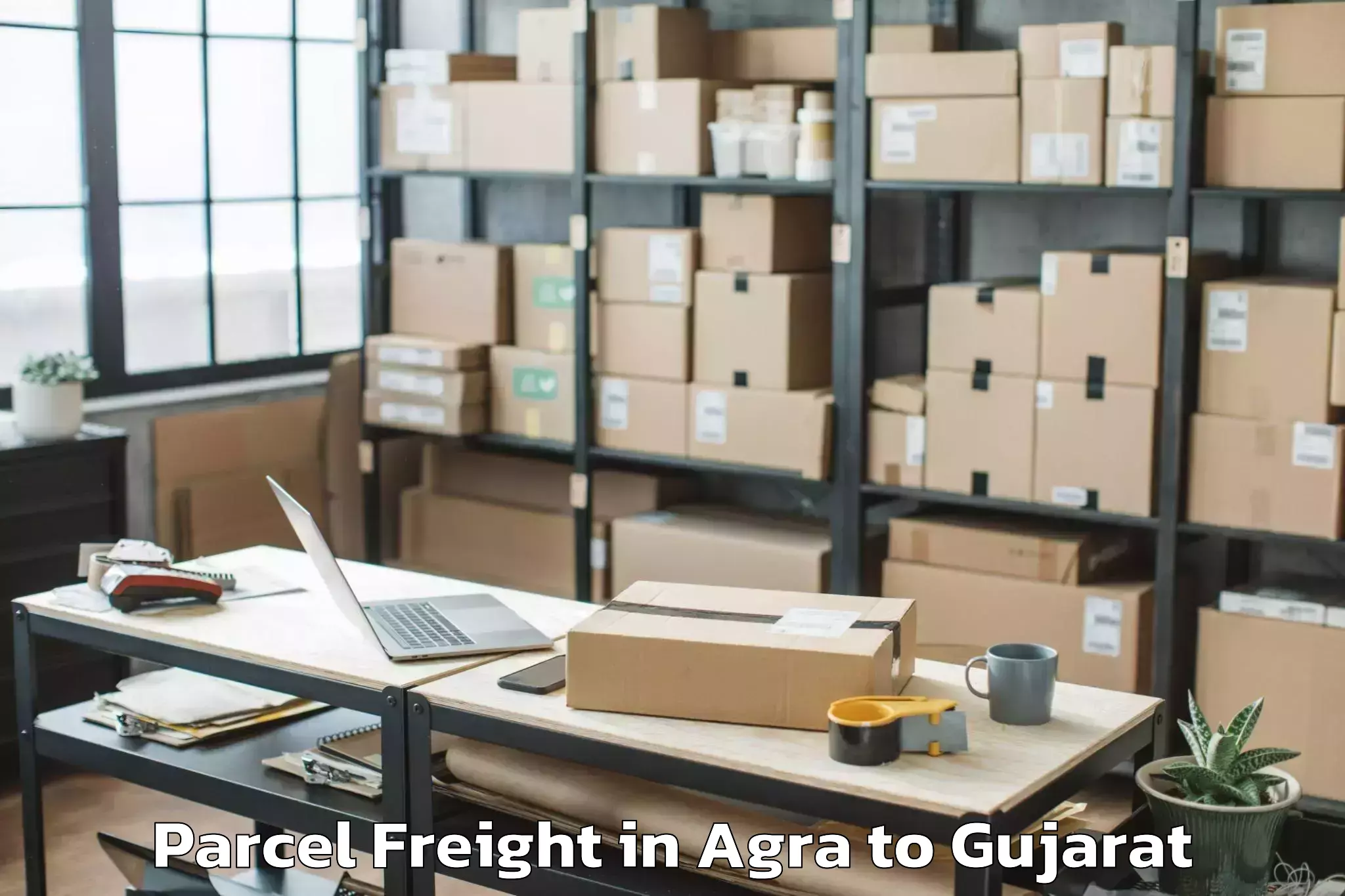 Reliable Agra to Udhana Parcel Freight